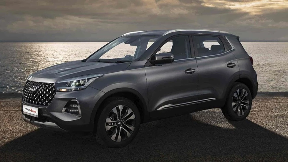chery tiggo 4 pro у дилера в автосалоне фаворит моторс купить новый сбоку спереди