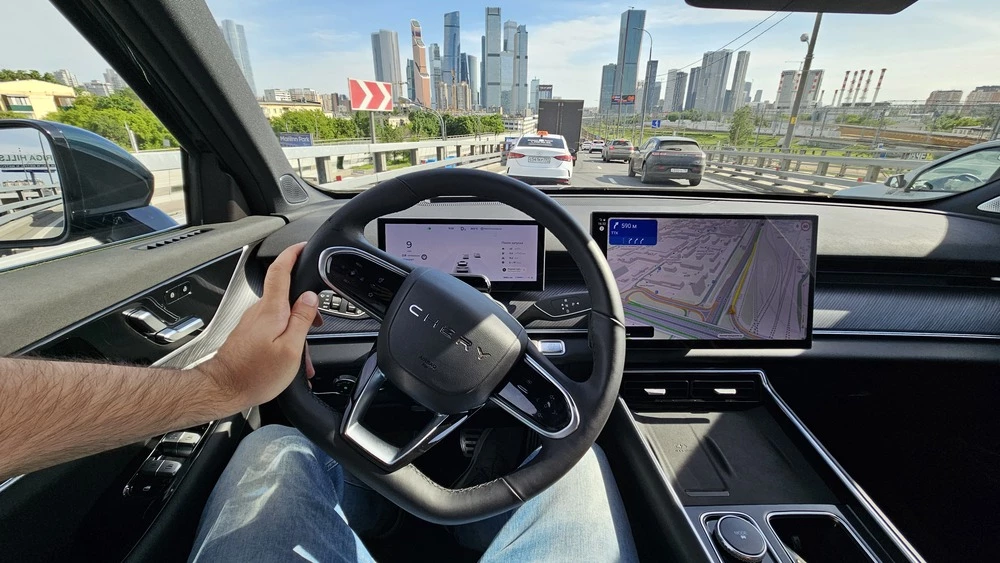 Chery Tiggo 9 салон интерьер водитель за рулем