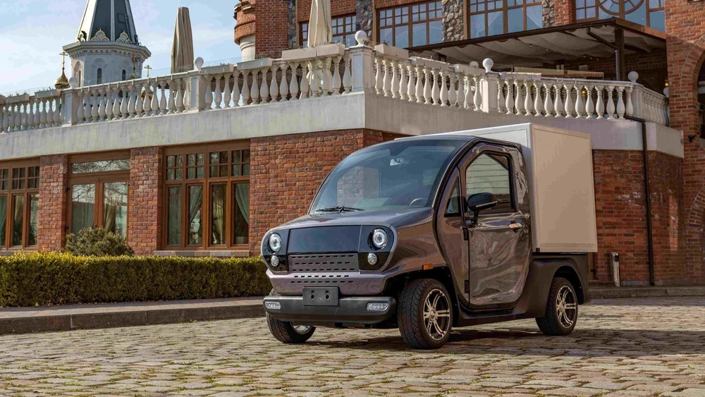 Электрический микрокар Eonyx Cargo сбоку спереди автотор
