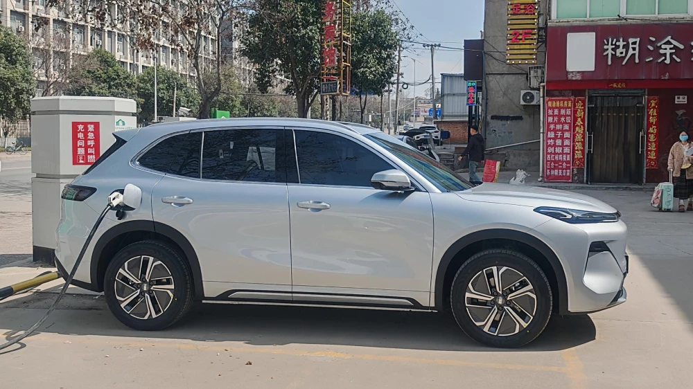 geely galaxy starship 7 ex5 em-i сбоку спереди кроссовер серебряный реальные отзывы китай плюсы минусы зарядка