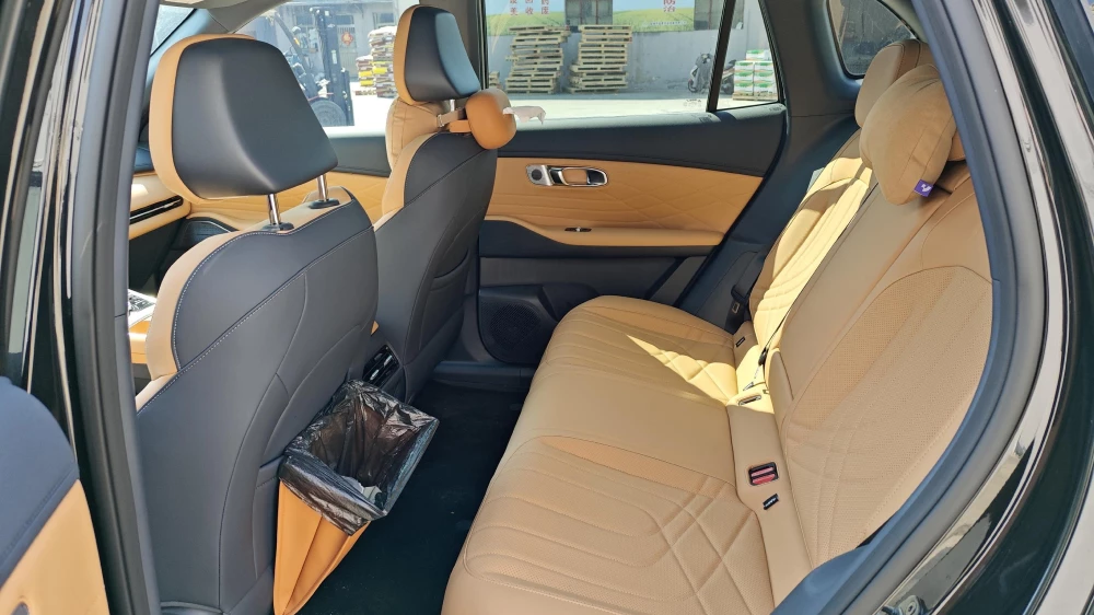 geely galaxy starship 7 ex5 em-i реальные отзывы китай плюсы минусы салон оранжевый коричневый второй ряд сидений