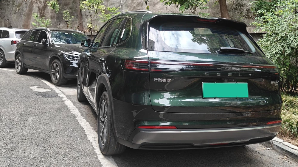 geely galaxy starship 7 ex5 em-i сбоку сзади кроссовер зеленый реальные отзывы китай плюсы минусы