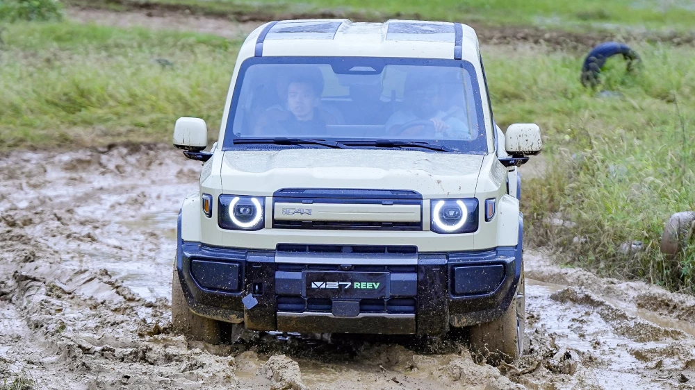 Chery iCaur V27 протестировали в Китае перед стартом продаж в России. Как показал себя SUV chery icaur v27 протестировали в китае перед стартом продаж в россии гибридный внедорожник спереди