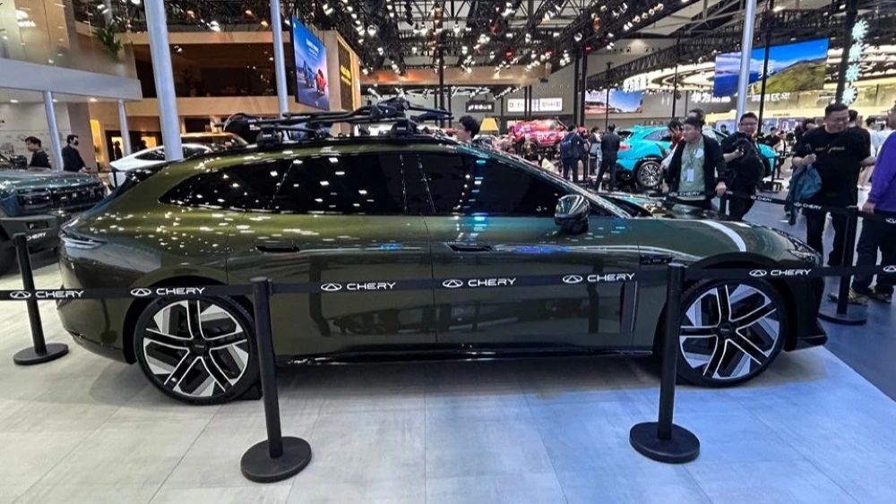 exlantix es7 gt сбоку автосалон гуанчжоу 2025