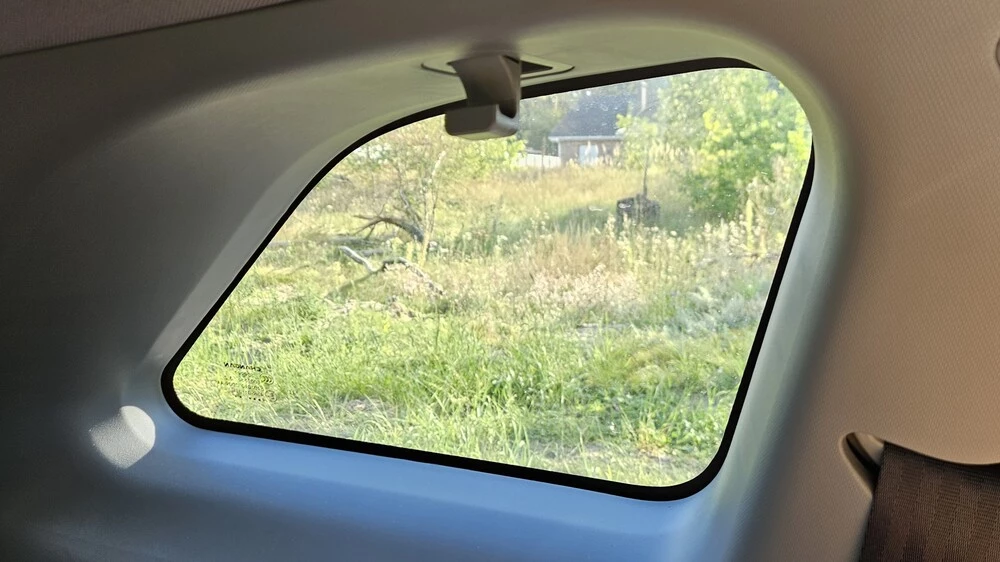 Changan CS75 Plus обновленный третьего поколения салон интерьер третий ряд окошко