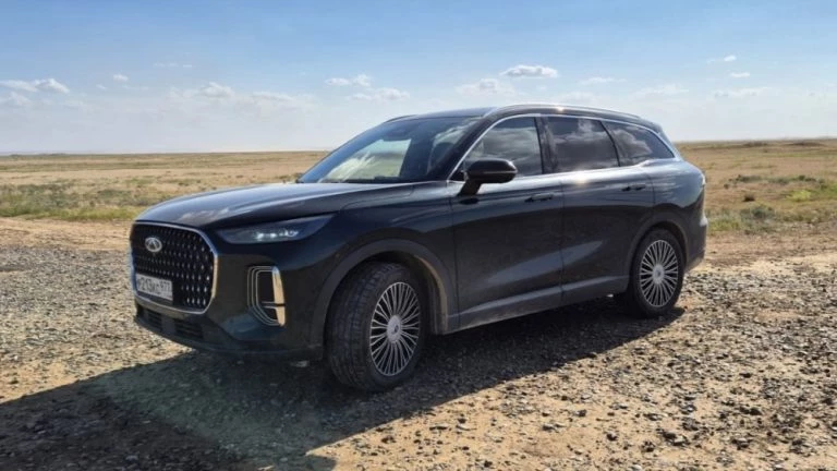 Chery Tiggo 9 андреев отпуск спереди сбоку в горах подкаст