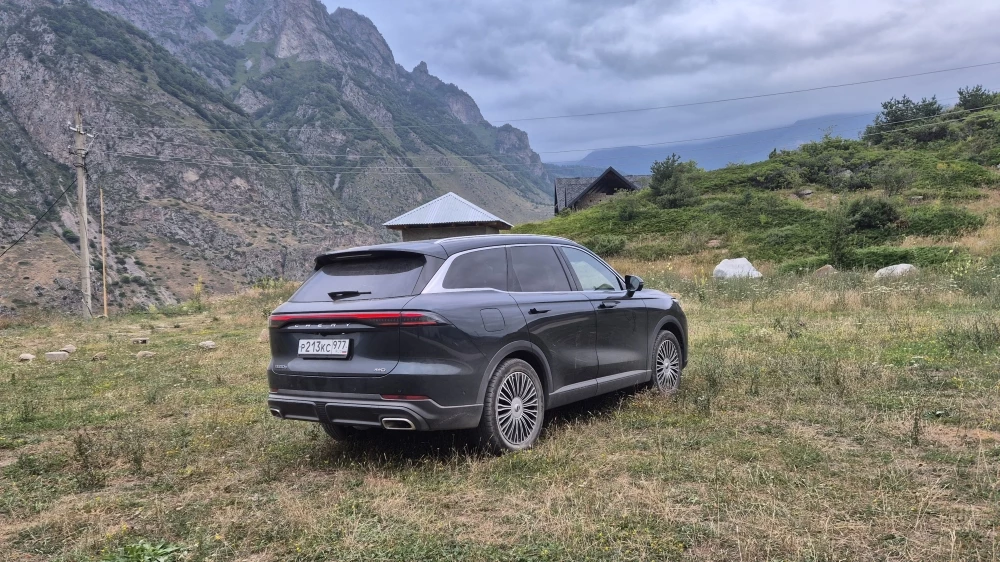 Chery Tiggo 9 андреев отпуск сзади сбоку в горах подкаст