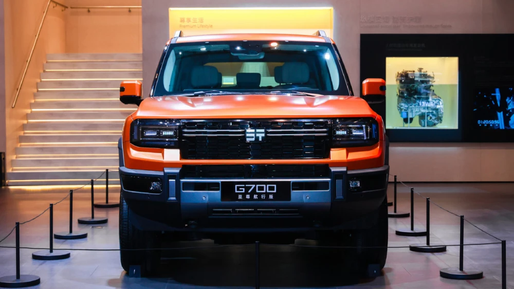 внедорожник jetour g700 гибридный автосалон в гуанчжоу 2025 спереди оранжевый появится в россии 2026 год
