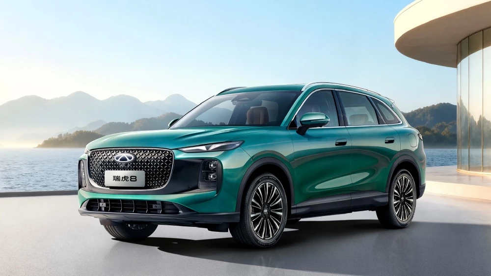 новый кроссовер chery tiggo 8 leopard edition сбоку спереди