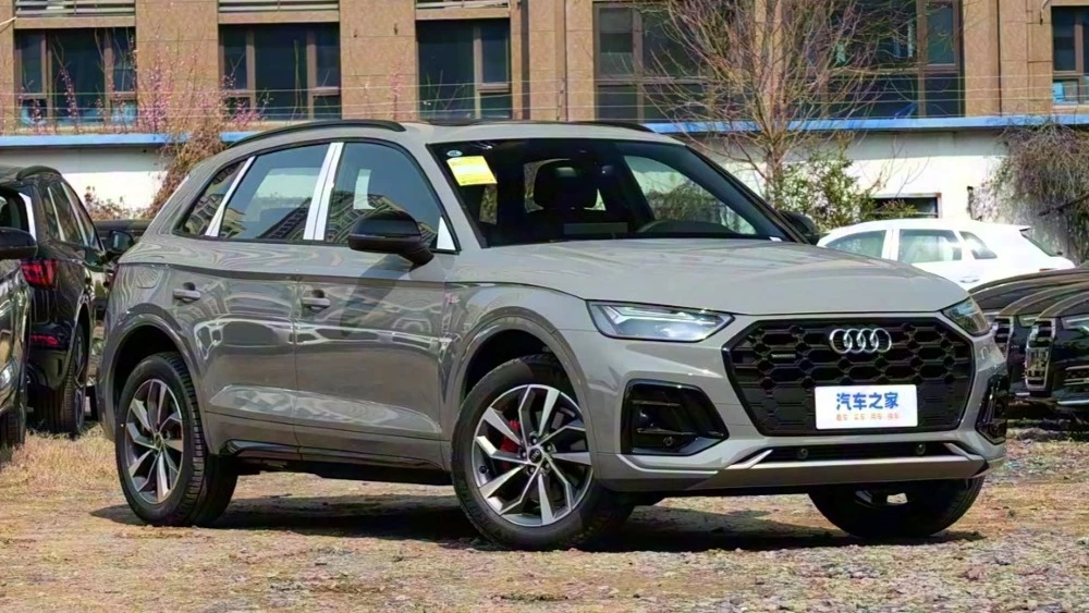audi q5l в китае кроссовер сбоку спереди