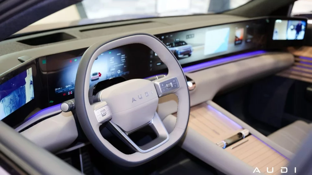 В Китае назвали победителей премии «Автомобиль года 2026» audi e5 sportback сбоку сзади шутинг брейк электромобиль салон белый