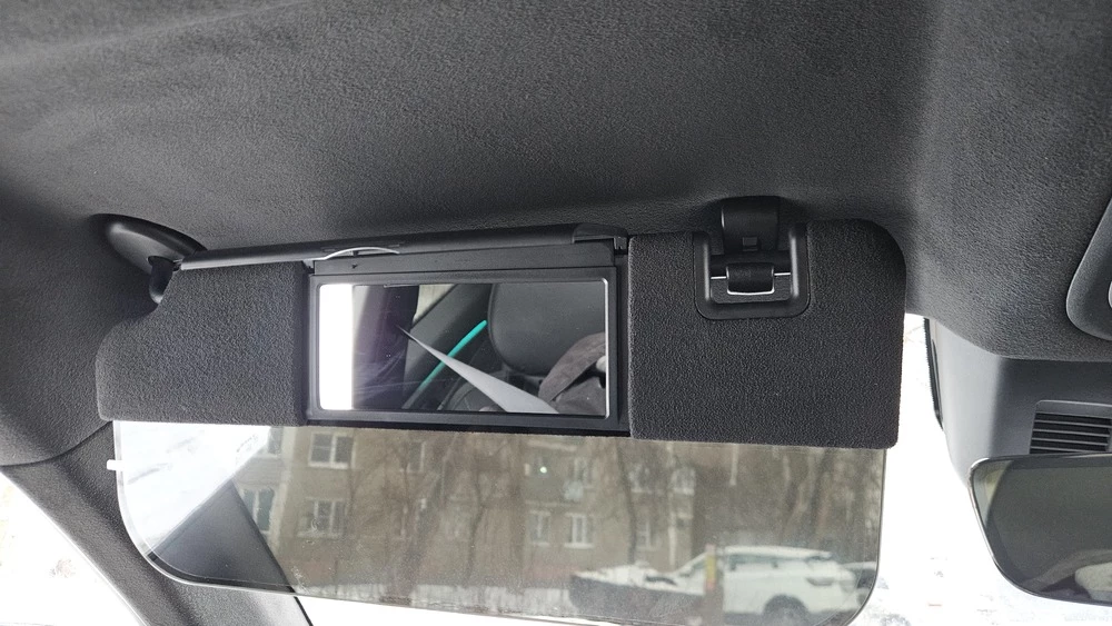 Geely Monjaro Flagship SE тест обзор салон интерьер солнцезащитный козырек