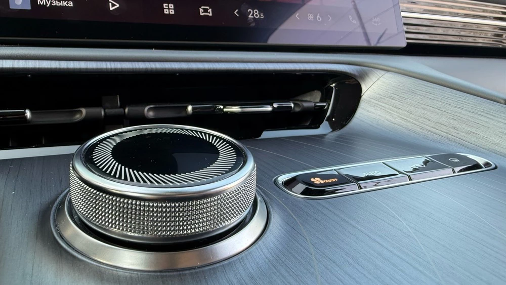 Geely EX5 в Казахстане тест салон интерьер тоннель шайба режимы