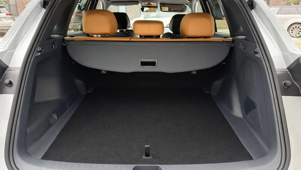 Geely Galaxy EX5 EM-i в Казахстане тест обзор салон интерьер багажник