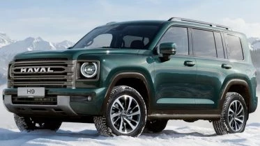 Внедорожник Haval H9 2026 модельного года сбоку спереди