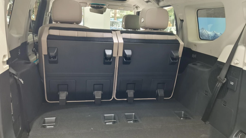 реальные отзывы плюсы минусы jetour g700 внедорожник гибридный коричневый салон багажник третий ряд сидений