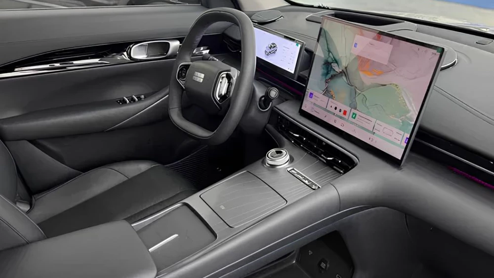 Три кроссовера марки Geely начали продавать в Узбекистане ex5 ev салон черный серый электромобиль