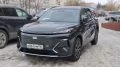 Geely EX5 EM-i тест Мишина сбоку спереди черный
