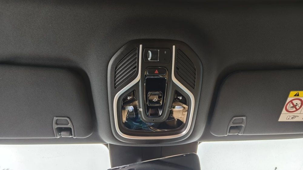 Geely EX5 EM-i тест Мишина салон интерьер потолочный блок