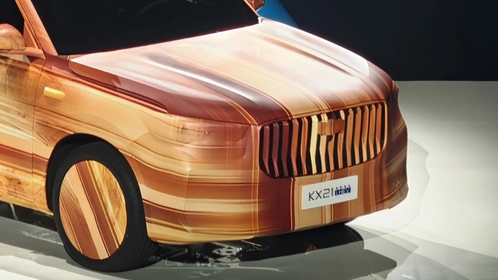 Geely анонсировала новый кроссовер с традиционным гибридом kx21 передняя часть