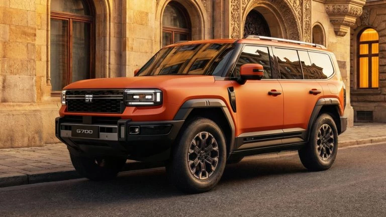 Jetour G700 начали сертифицировать в России гибридный внедорожник сбоку спереди оранжевый