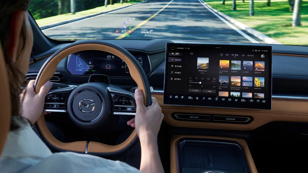 Два китайских автомобиля наградили в премии World Car Awards mazda ez-6 changan седан салон коричневый