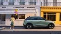 Geely EX2 сбоку зеленый