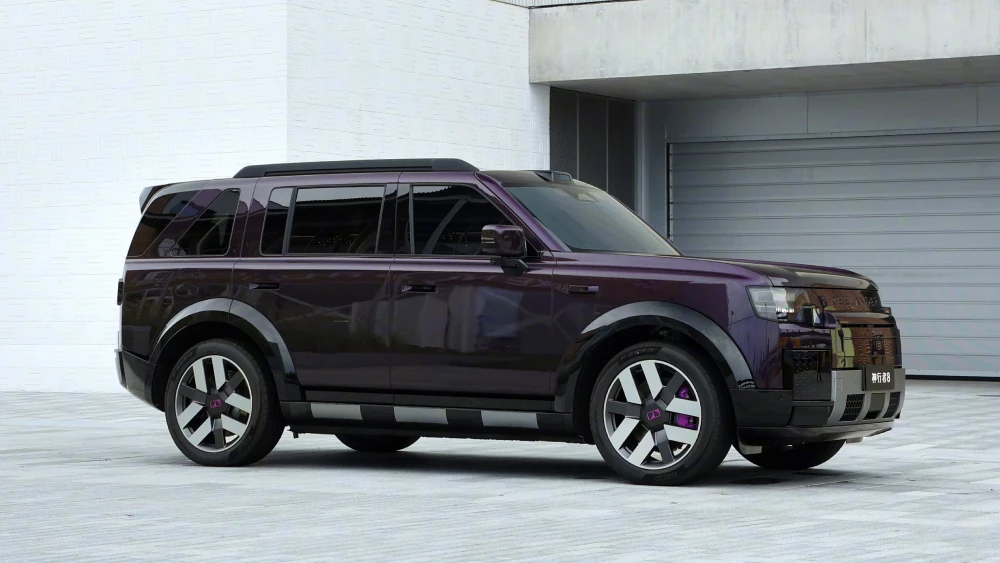 freelander 8 внедорожник chery jaguar land rover сбоку спереди фиолетовый