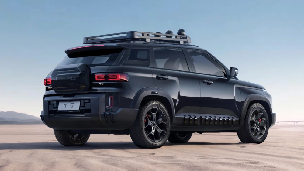 Цены на обновленный Geely Cowboy назвали в Китае кроссовер сбоку сзади черный