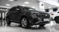 Geely Okavango у дилера в автосалоне сбоку спереди регинас челябинск
