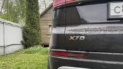 Belgee X70 редакционный гараж сзади логотип черный