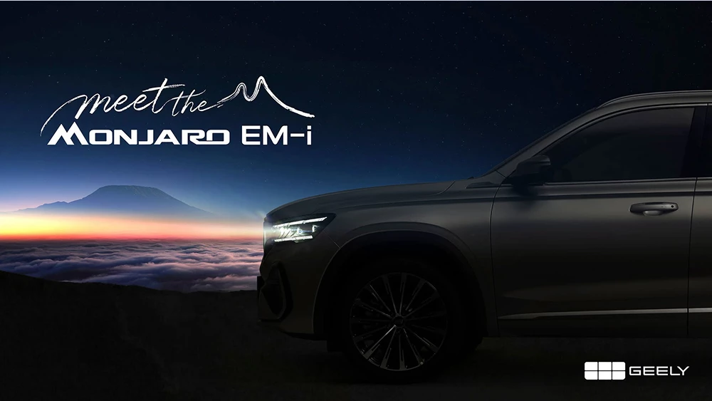 Кроссовер Geely Monjaro получит продвинутый гибрид EM-i спереди кроссовер тизер сбоку