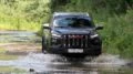JAC T9 черный спереди тест-драйв река