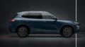 У гибридного Geely EX5 EM-i появился полный привод кроссовер сбоку синий