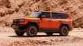 Jetour G700 готовятся производить в России сбоку спереди внедорожник рамный гибрид параллельный оранжевый