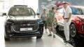 Кроссовер Tenet T8 у дилера в автосалоне спереди Регинас Миасс