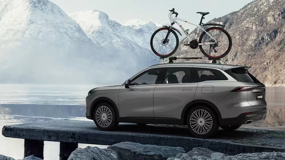 велосипед Chery на крыше Tiggo 9 в России