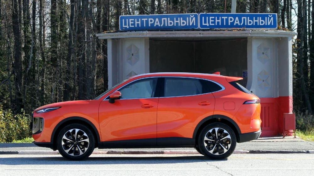 Tenet Plus L6 оранжевый сбоку тест-драйв